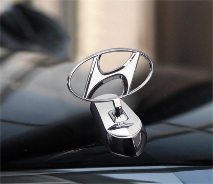 Motorhjelmsemblem med billogo